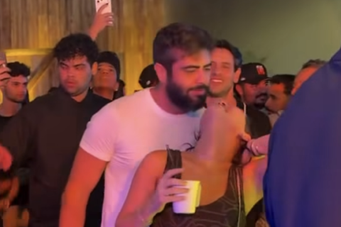 Henrique, dupla de Juliano, causa polêmica ao puxar cabelo da esposa durante momento público